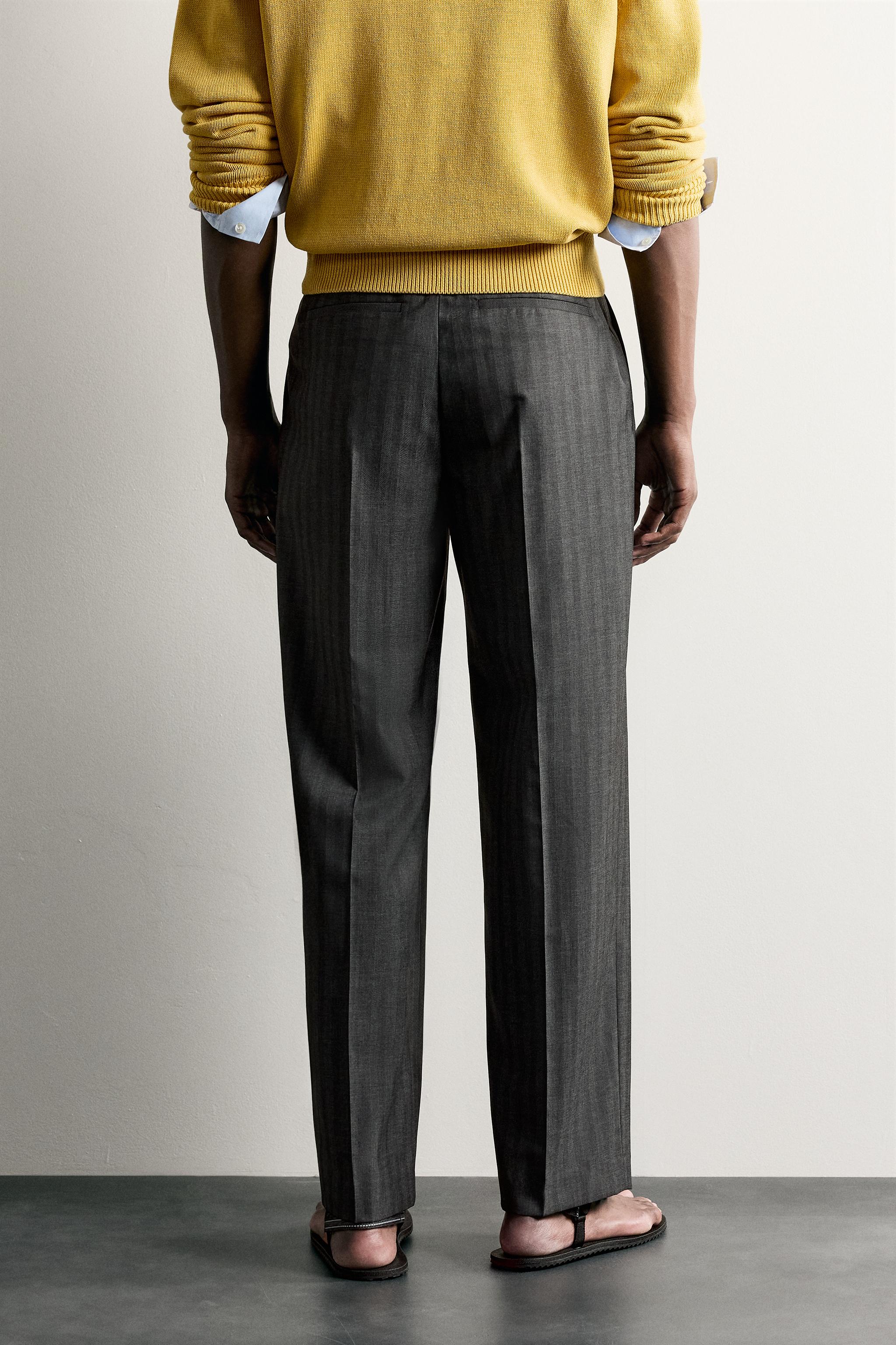 STRIPED PLEATED RELAXED FIT PANTS